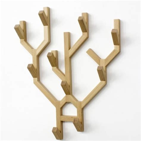 Typically, wall hooks hang up your outerwear and keep bulky coats and jackets neatly. ComingB Wall Mounted Oak Tree Coat Hanger from Black by Design