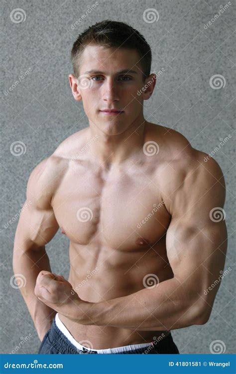 Young Muscular Man Flexing His Biceps Stock Image Image Of Body