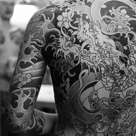 Japanese water with flowers tattoo on side rib. 50 Japanese Back Tattoo Designs For Men - Traditional Ink ...