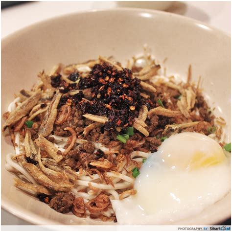 While he loves all things hot and spicy, she loves the runny yolk of poached egg. Legendary "Kin Kin Chilli Pan Mee" Opens in Singapore