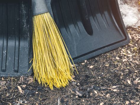 Working With Broom Sweeps Lawn From Fallen Leaves Stock Photos