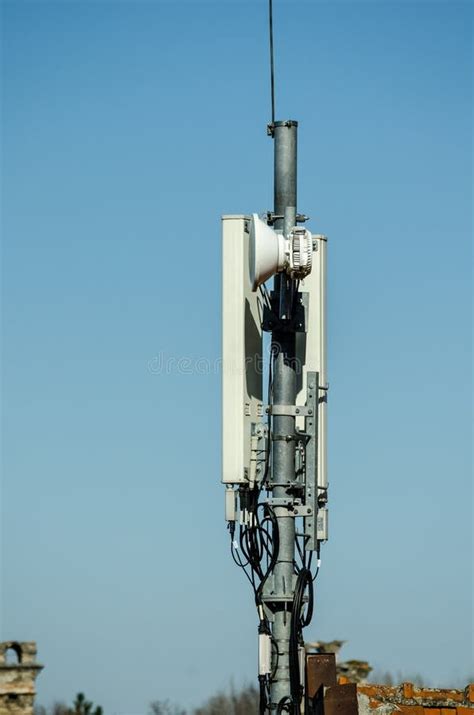 Telecommunication Tower Antenna With Transmitters On Metal Pole