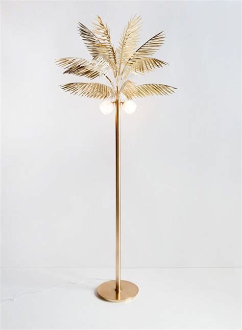 The design is complete with a thin gold stand and. Syrette Lew palm lamp. | CAO | Pinterest | Palm, Lights ...