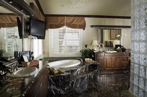 To make a space more masculine, you could incorporate dark colored tiles, marble and concrete and vintage décor along with the contemporary interiors. 15 Stunning Masculine Bathroom Design Ideas