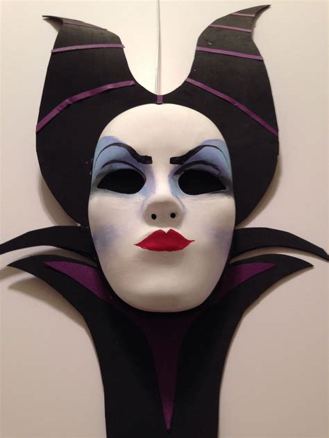 The Maleficent mask created from scraps around the house and a mask