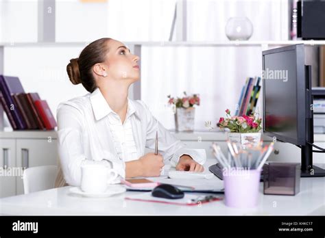 Tired Woman Manager In The Office Stock Photo Alamy