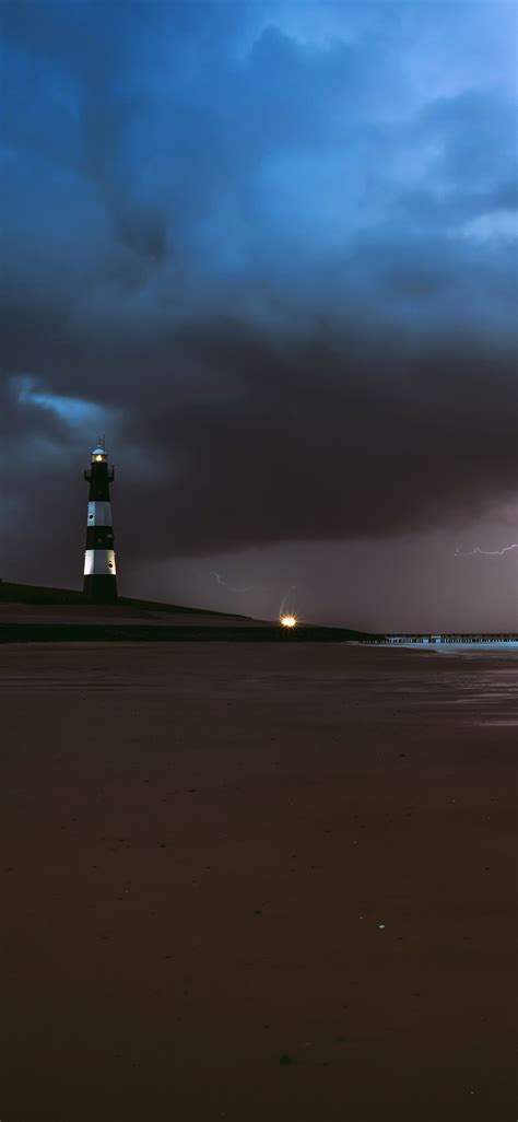 1125x2436 Lighthouse Lightning Sea Ocean Beach Weather 5k Iphone Xs