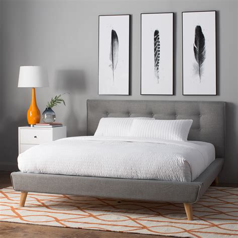 Constructed from solid rubberwood and engineered wood; Langley Street Rasmussen Upholstered Platform Bed & Reviews | Wayfair.ca