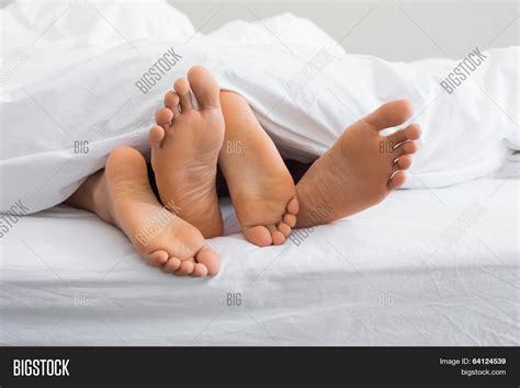 couples feet sticking image and photo free trial bigstock