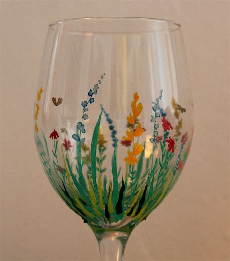 Field Of Flowers Hand Painted Wine Glass 20 00 Via Etsy Wine Glass Crafts Hand Painted