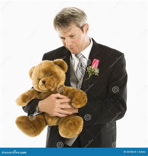 Groom Holding Teddy Bear Stock Images Image 2678634