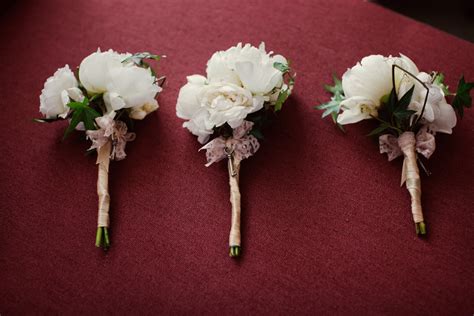 Or, if you want your bridesmaids to hold flowers, keep empty vases on your reception tables so your bouquets will do double duty as centerpieces after the ceremony. Michael Daigian Design: Real Wedding: Lindsay & Jake