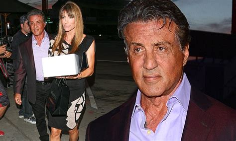 Sylvester stallone and wife jennifer flavin / getty images. Sylvester Stallone and wife Jennifer Flavin carry cake to ...