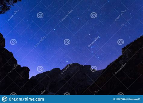 Night Sky With Stars At Dolomites Mountains Italy Stock
