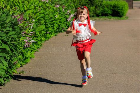 Little Girl Running Around The Park In The Summer Stock Image Image