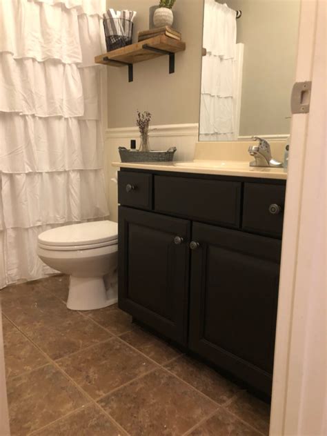 This guide reviews how to paint a bathroom vanity and as well as the important do not paint over the marks or labels on the door faces and other parts that indicate where they go. Paint your bathroom cabinet for a CHEAP and easy DIY! $100 room challenge, week 3! | Wilshire ...