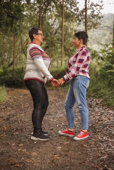 Older Lesbian Couple On A Date In The Woods Photos By Canva