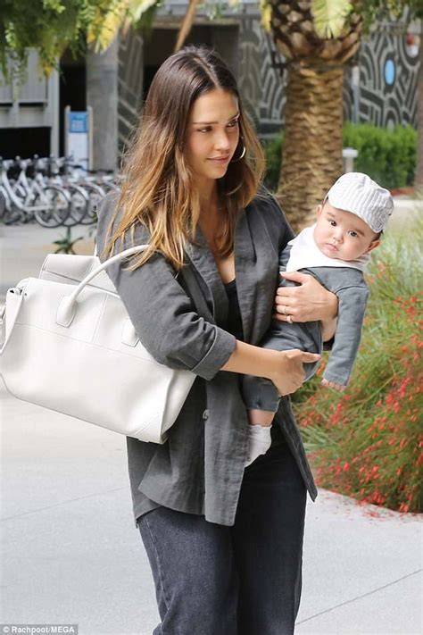 Jessica Alba Glows While Carrying Five Month Old Son Hayes To Work In
