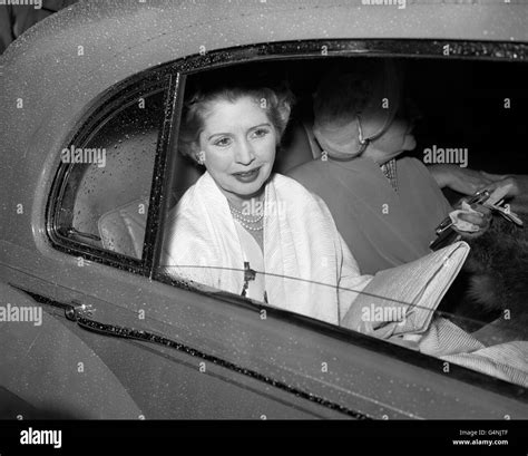 Smiling Faintly Lady Docker Pictured In The Car As She Drove Away From
