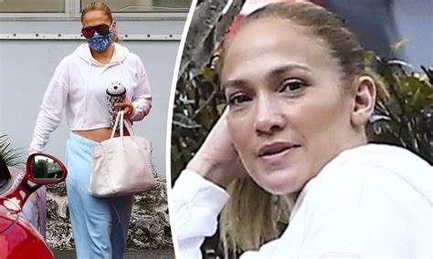 jennifer lopez flashes midriff in cropped hoodie and baggy sweatpants as she heads to lunch in miami