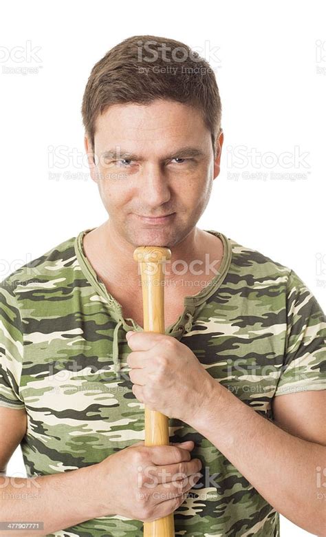 Man Holding Baseball Bat On White Background Stock Photo Download