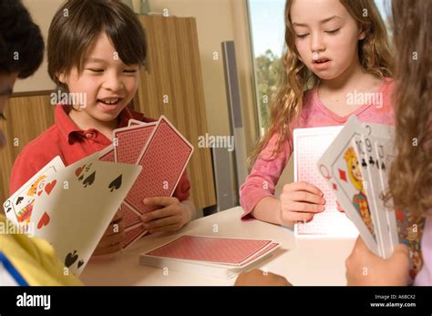 Portrait Of Kids Playing Cards Stock Photo Alamy