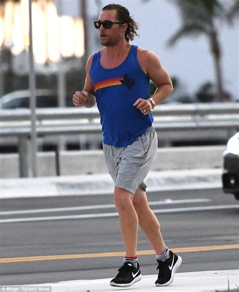 Matthew Mcconaughey Shows Off Muscular Arms While Jogging Daily Mail Online