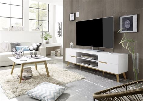 Each frame has a matching streamlined look with slatted arms and sled legs. 2020 Best of Matching Tv Unit And Coffee Tables