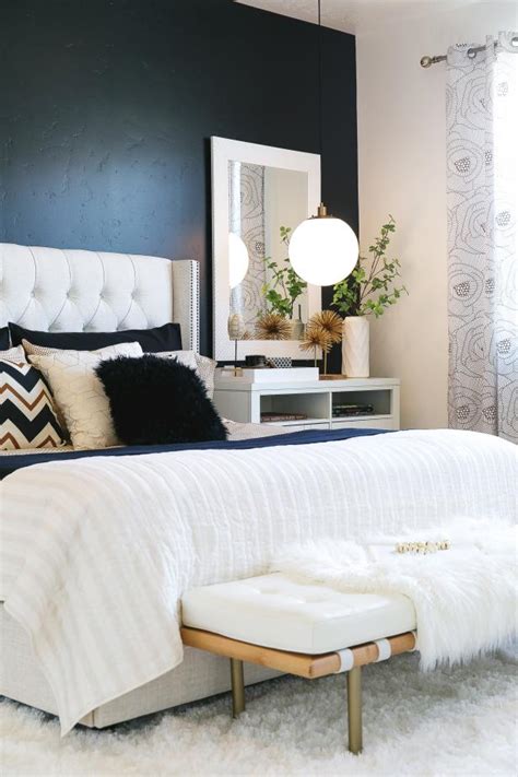 Also, you can google search black and white bedrooms for more ideas. Contemporary Bedroom With Black Accent Wall and White ...