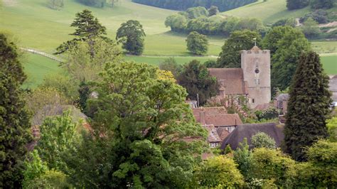 A View Of Singleton Village In West Sussex Amid The South Downs