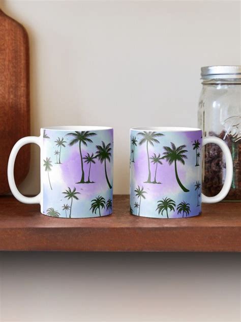 Two Coffee Mugs Sitting On Top Of A Wooden Shelf Next To A Glass Jar
