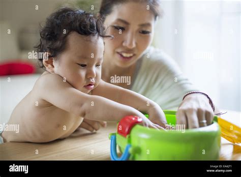 Mother Playing With Her Baby Boy Stock Photo Alamy