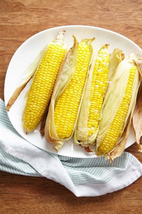 Use softened butter, garlic salt, pepper, and a mixture of your favorite herbs, such as rosemary view image. How To Make Oven-Roasted Corn: 3 Simple Methods | Recipe ...