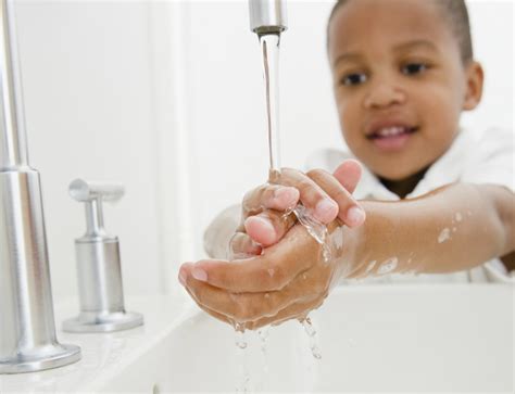 Boy Washing Hands Sized