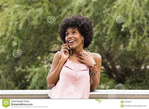 Portrait Of A Happy Young Beautiful Afro American Woman Smiling Stock