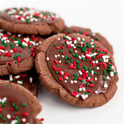 Our list of best christmas cookie recipes has something for everyone, from soft gingerbread cookies to and this gingerbread cookie recipe is finished with turbinado sugar instead of icing, which is a and a chocolate icing drizzle makes them look even more fun. Chocolate Frosted Christmas Cookies - Garnish & Glaze