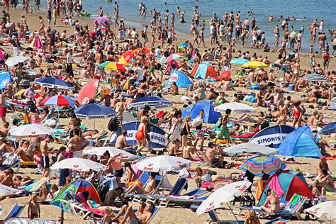 Royalty Free Crowded Beach Pictures Images And Stock Photos Istock