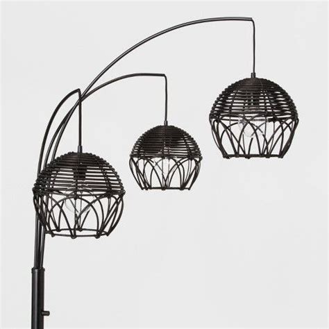 Base is constructed of antiqued brass. Switch up your lighting with the unique look of the Rattan ...