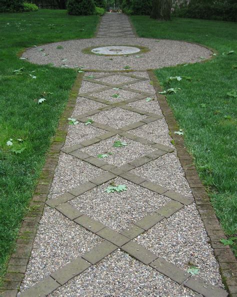 Consider mixing larger stones or crushed stone/dust into your pea gravel to stabilize it rather than removing it. Monday Morning Finds - Re-Use Old Bricks | Pea gravel ...