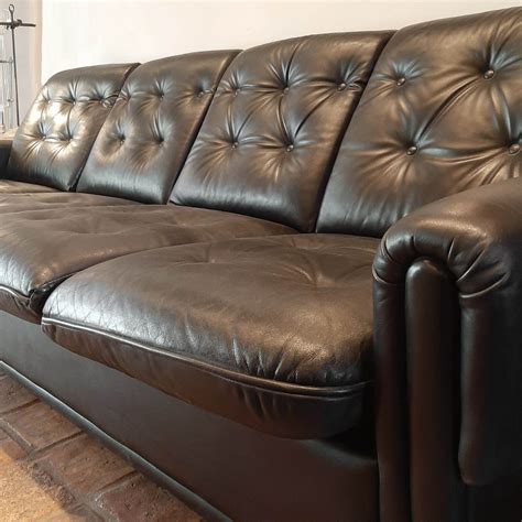 Vintage Four Seater Sofa Made Of Black Leather Piet Jonker