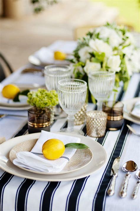 Here, the weight of onyx flatware, dark stoneware and cast iron serving pieces is softened by the addition of worn wood and. Editors' Picks: 20 Lovely Table Setting Wedding Ideas that ...