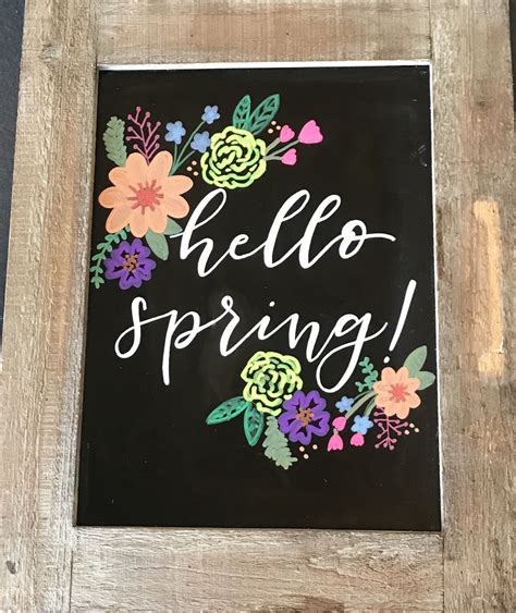 Welcoming Spring With A Chalkboard Sign