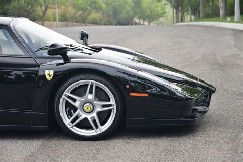 Top notes are lime, plum, bergamot and red apple; Black Ferrari Enzo for Sale in the US at $3,400,000 - GTspirit