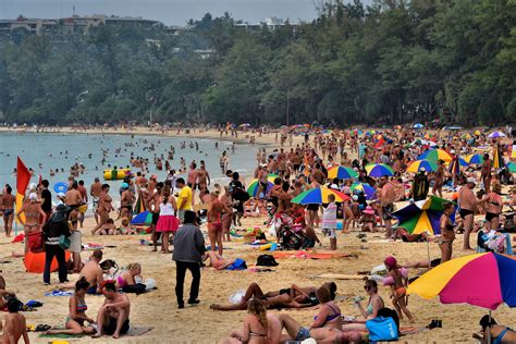 Very Crowded Sandy Beach At Kata Beach In Phuket Thailand Encircle Photos