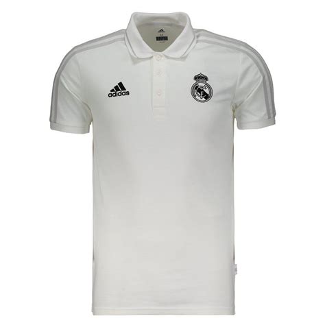 Cut for a slim fit, it's made from comfortable piqué fabric. Adidas Real Madrid Polo Shirt - FutFanatics