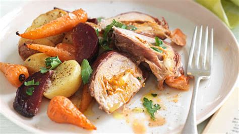 Push vegetables to edges of pan; Recipe: Pork loin with roasted vegetables | Sainsbury's
