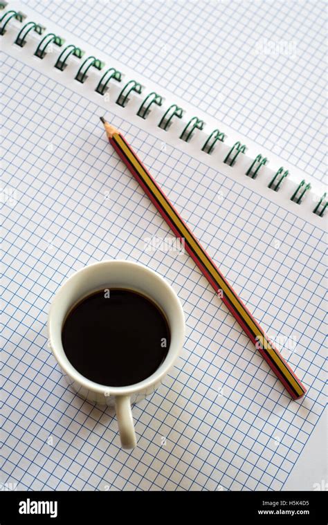 Notebooks And Pencils With Cup Of Coffee Stock Photo Alamy