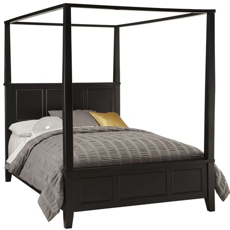 This elegantly designed bed includes a headboard, footboard and all pieces needed for assembly. Bedford Black King Canopy Bed | Homestyles