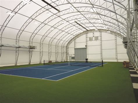 Weight machines and free weight room. Indoor Tennis Facilities | ClearSpan