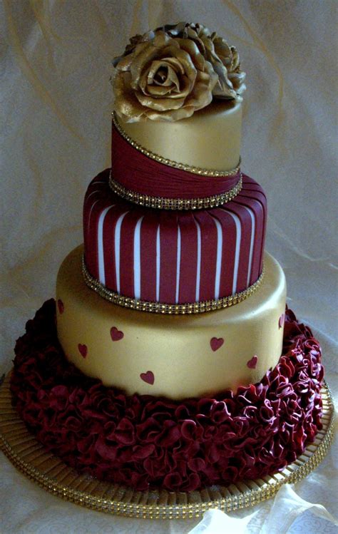 In a large bowl, whisk the cake flour with the baking powder and salt. Gold And Burgundy Wedding Cake With Ruffles And Roses ...